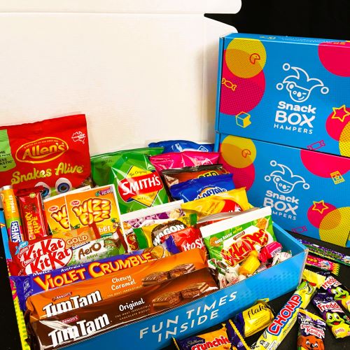 snack box gift hampers filled with snacks in a bright box