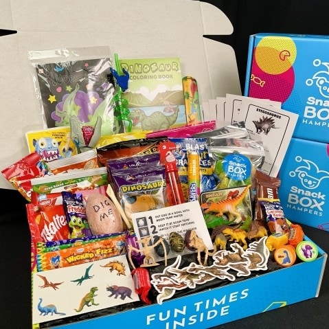 childrens dinosaur gift hampers filled with dinosaur themed treats