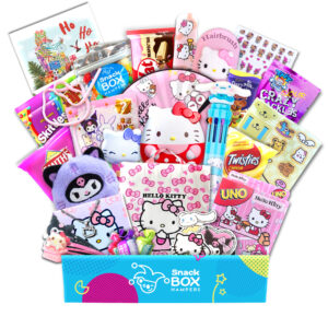 a christmas gift box with hello kitty merch and snacks in it