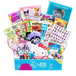 a gift hamper with hello kitty merchandise and lollies for graduation